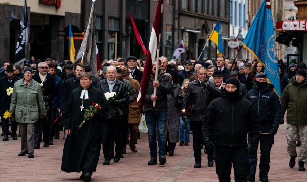 Участники шествия в Риге, посвященного памяти Латышского добровольческого легиона СС, Латвия, 16 марта 2023 Участники шествия в Риге, посвященного памяти Латышского добровольческого легиона СС, Латвия, 16 марта 2023